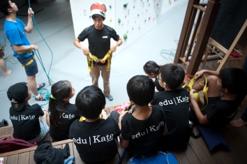 edukate students being taught awl climbing and safety Holistic education
