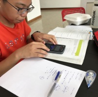 Dunman High Yishun student doing A Math Trigonometry in advance of school. Tutors teach from the beginning until students master the topic. Notice his working too, random shot, and all working is shown.