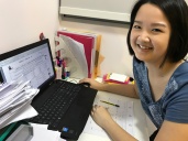Yishun Tutor Yuet Ling in the Office working on new materials. We customise all our classes for our students.